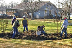 Workers at the Empowering Believers Church putting in a rain garden. Photograph, Interfaith Partners for the Chesapeake